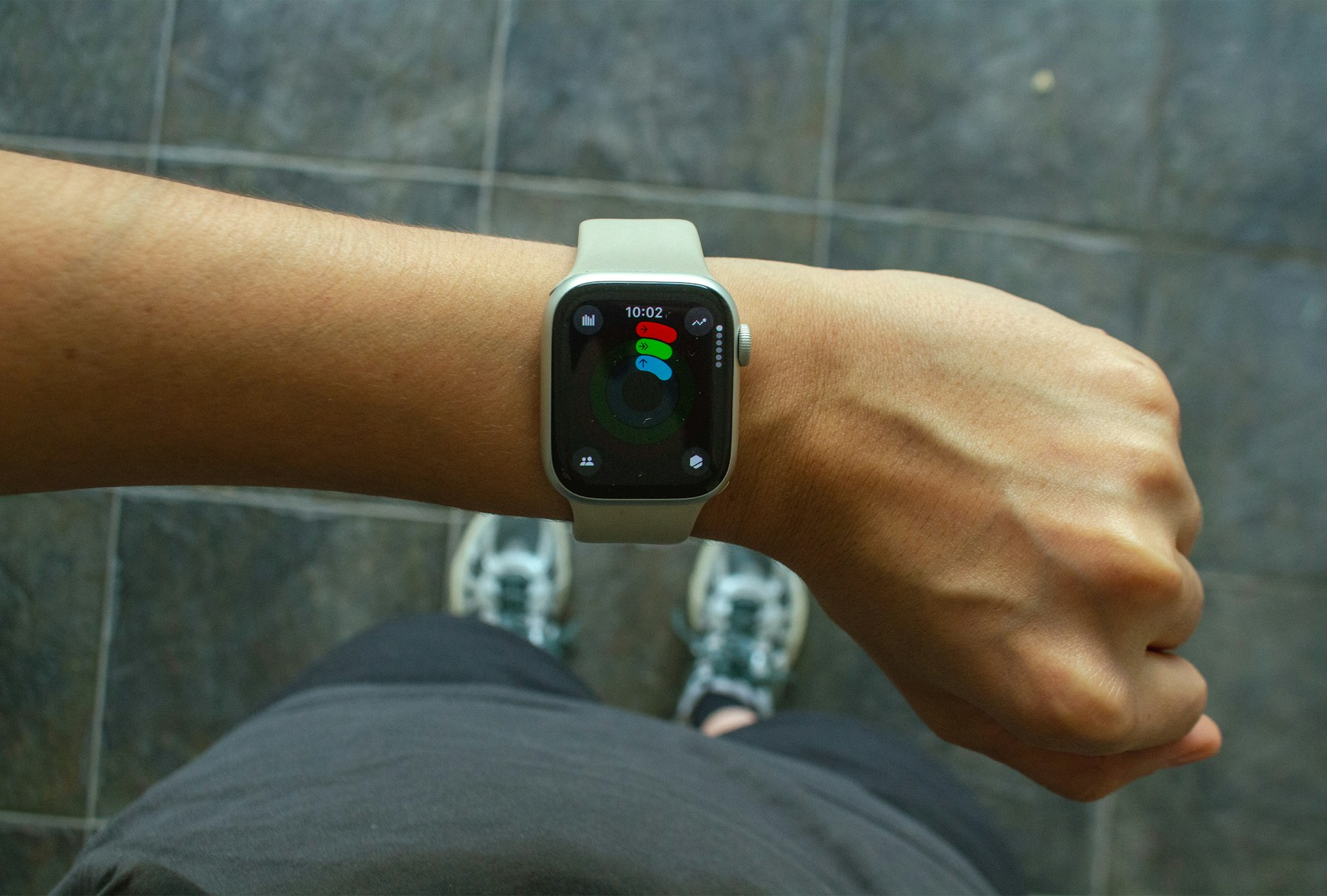 Wrist with an Apple Watch and fitness app before a workout